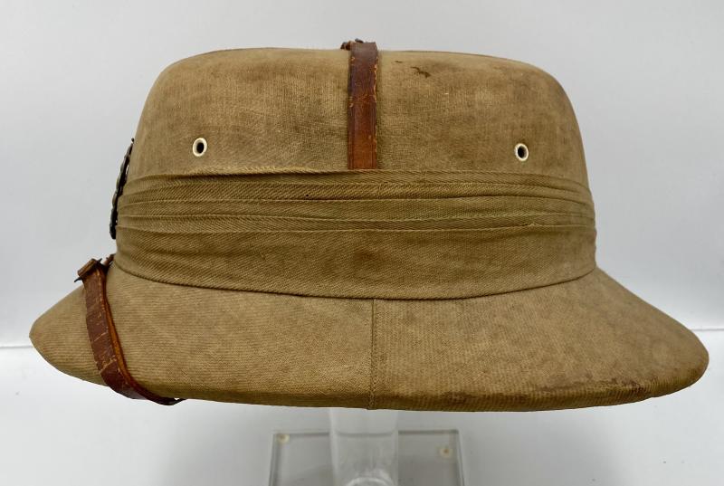 VERY UNUSUAL IRANIAN BADGED PITH HELMET