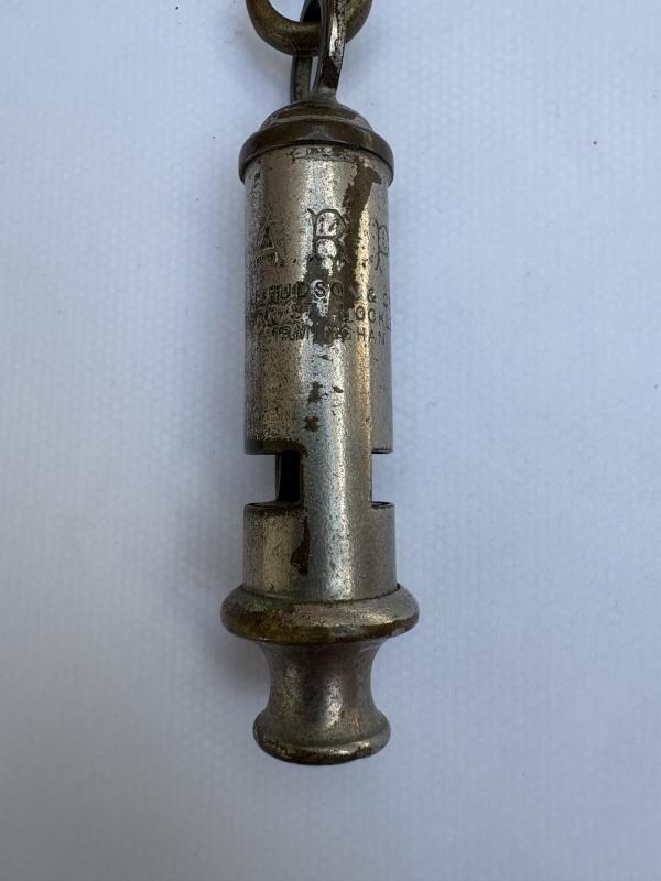 WW2 ARP WHISTLE ON LEATHER TAB (MARKED)