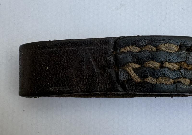 WW2 ARP WHISTLE ON LEATHER TAB (MARKED)