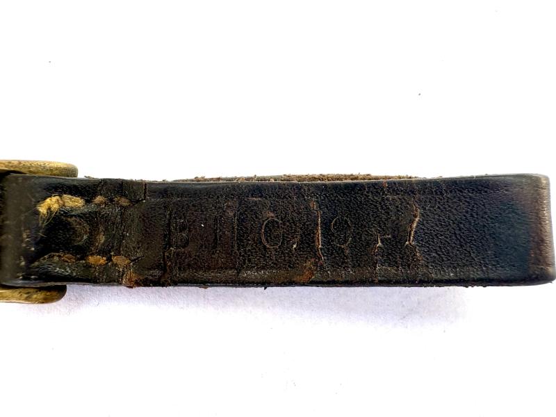 WW2 ARP WHISTLE ON LEATHER TAB (MARKED)