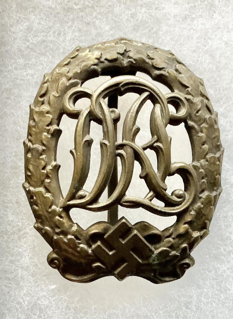 WW2 GERMAN DRL SPORTS BADGE & BOOK