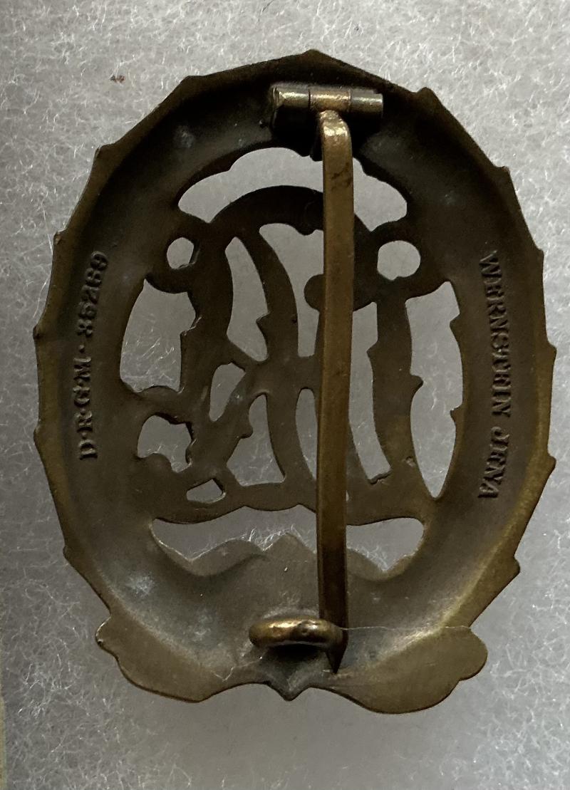 WW2 GERMAN DRL SPORTS BADGE & BOOK